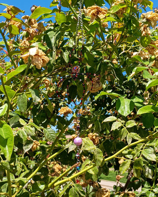 atrapasol decorativo araña detalle